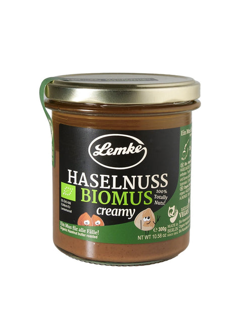 Lemke Haselnuss Biomus creamy 300 g Glas mit Produktetikett auf weißem Hintergrund