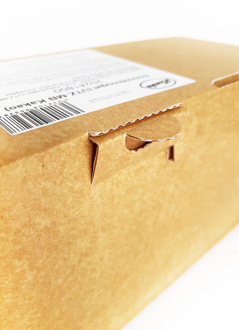 Detailaufnahme eines Kartons für dunklen Lemke Haselnuss-Nougat mit Verschlusslasche