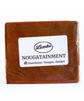 Verpackter dunkler Haselnuss-Nougat von Lemke mit Produktetikett