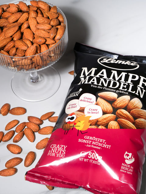 Lemke Mampfmandeln 500g mit gerösteten Mandeln in Glasschale, veganer Mandel-Snack