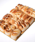 Lemke Edelmarzipan Teekonfekt 100g with flame-browned marzipan pieces on a white background