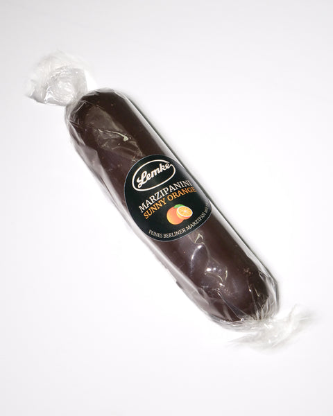 Back view of Lemke Marzipanini Sunny Orange 120g chocolate-coated marzipan loaf with product label