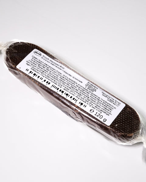 Back view of Lemke Marzipanini Very Cherry 120g chocolate-coated marzipan loaf with product label