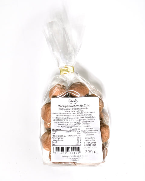 Back view of Lemke Marzipankartoffeln Zimt 200g gift bag with product label and cinnamon marzipan pieces