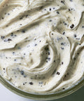 Close-up of Lemke Stadtstreicher Cookies & Cream spread with creamy texture and cookie pieces